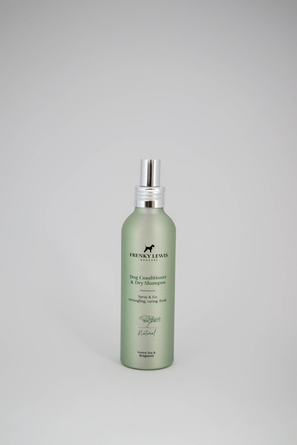 Green bottle of dog shampoo with silver cap on a gray background