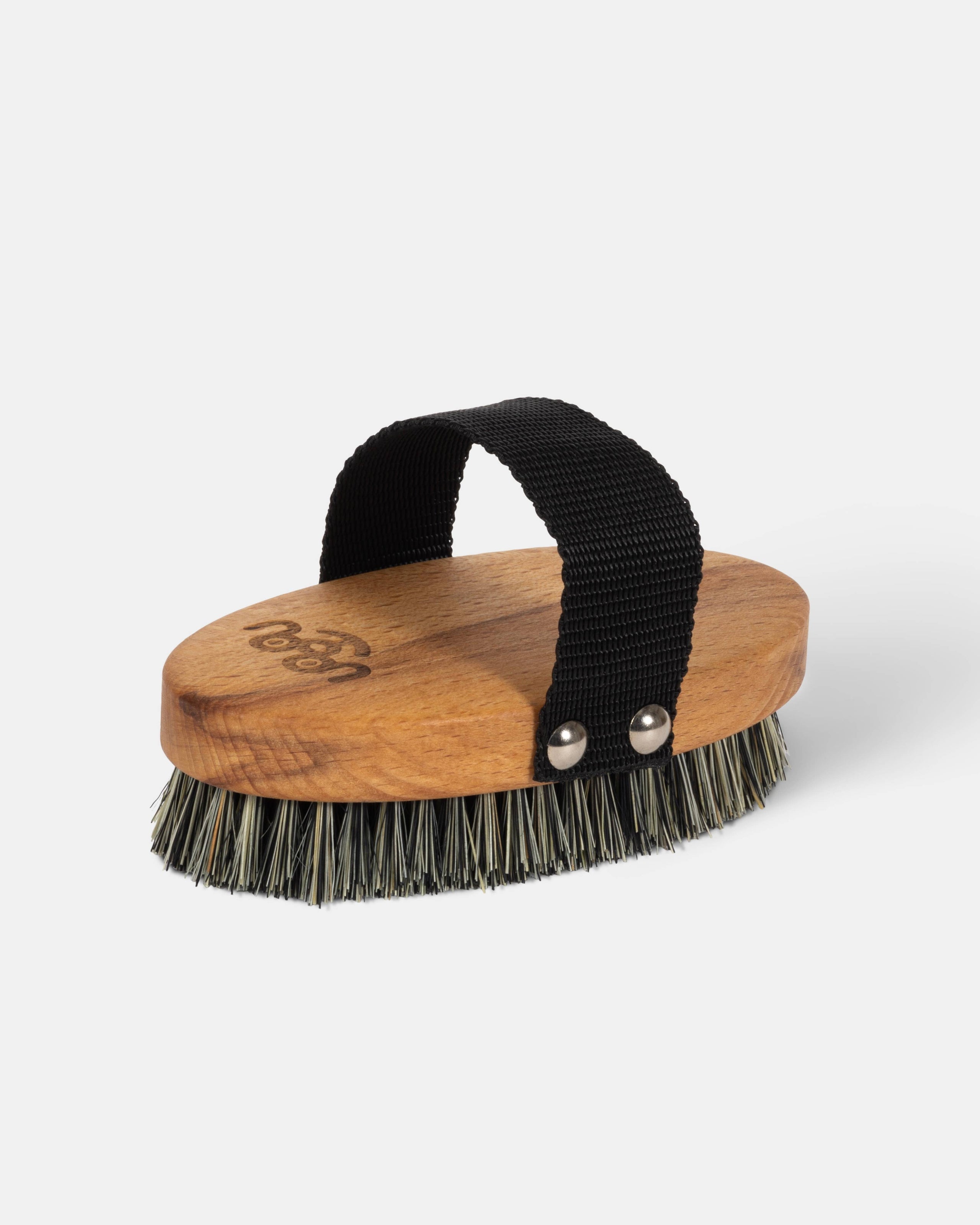 Wooden brush with bristles and a black handle on a white background